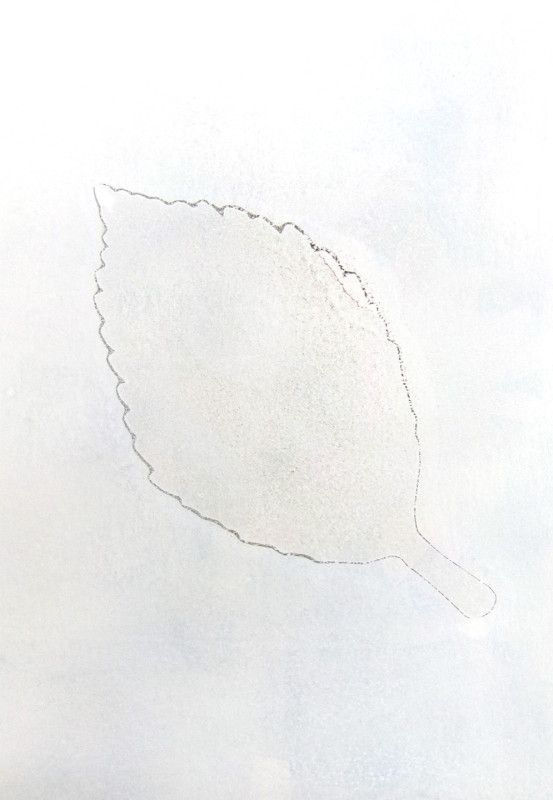 An image with almost no color. A leaf shape appears lightly outlined at the center.