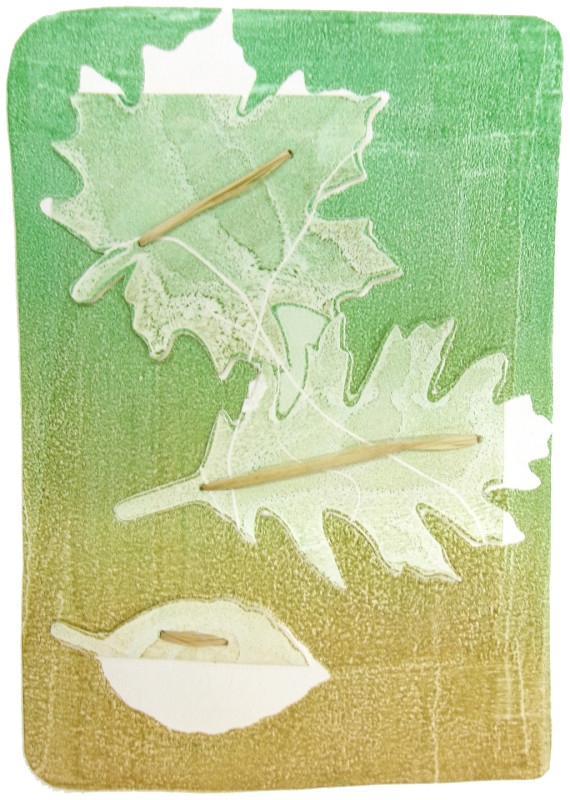 A print that lappears to have been made by laying ink on a page overtop a maple leaf, an oak leaf, and a beech leaf. There is rafia sewn into the leaf areas. The ink colors progress from jade green to tan, top to bottom.