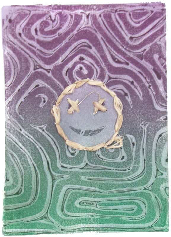 An abstract image with maze-like squiggles printed in a gradient that moves from purple at the top to green at the bottom. At the center, there is a circular shape in a greyish light purple, with an upside-down crescent in its lower half. This shape is outlined in rafia, with two rafia 