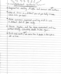 A notebook page with text reading 