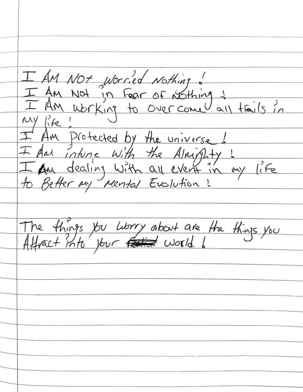 A notebook page with text reading 